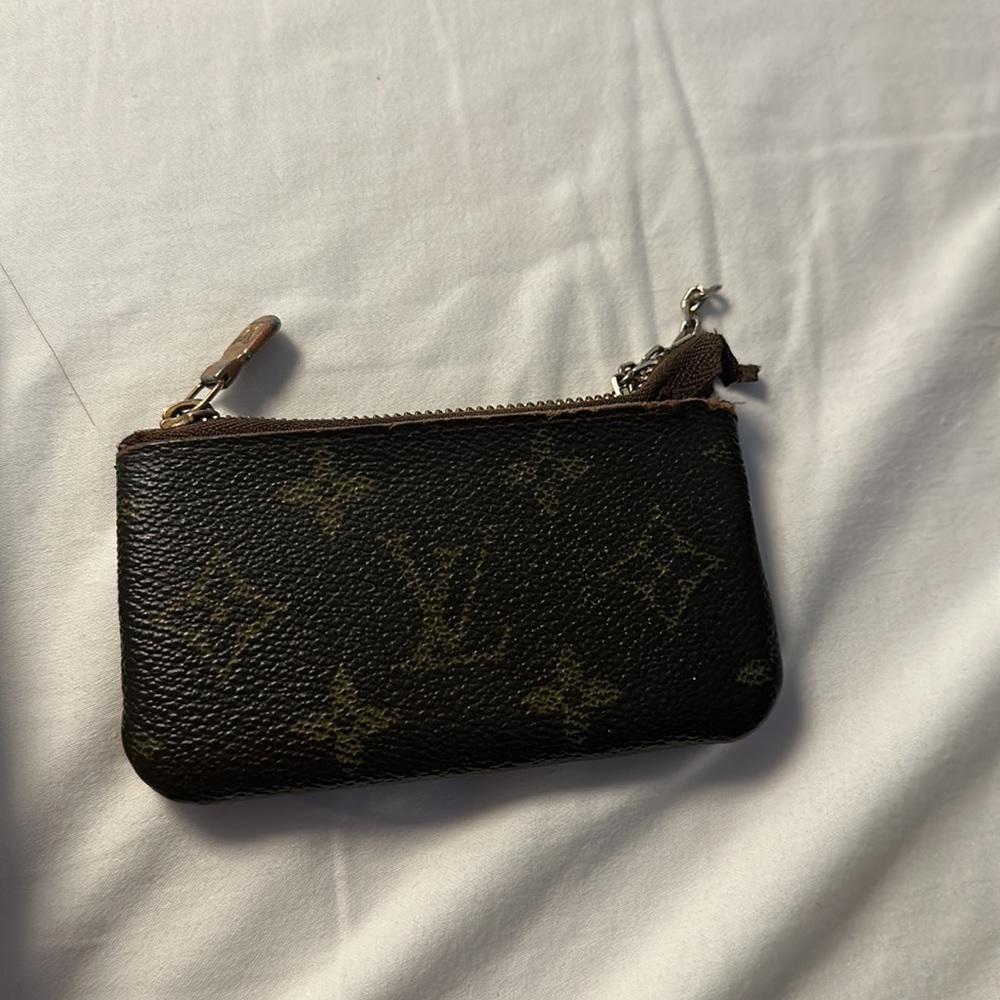 Authentic Louie Vuitton key pouch. Very worn condition